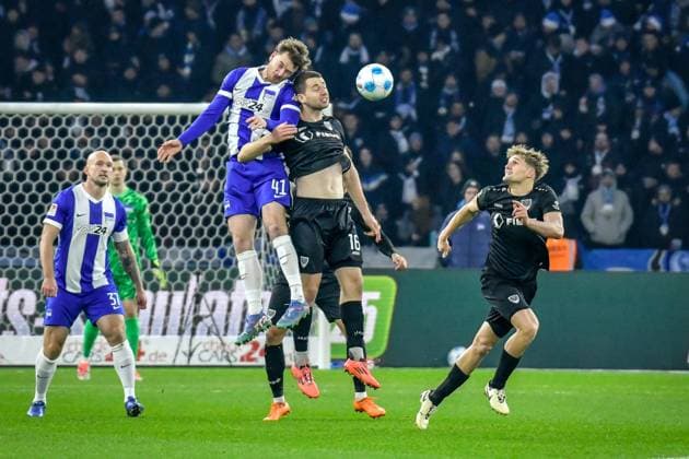 Soccer 2 Bundesliga Hertha BSC Berlin Preußen Münster 13 12 2024, xdanx, Soccer 2 Bundesliga Hertha BSC Berlin Preußen Münster v l Pascal Klemens Hertha BSC 41 ,Torge Paetow SC Preußen Muenster 16 ,Zweikampf, Duell, Kampf, tackle DFL DFB REGULATIONS PROHIBIT ANY USE OF PHOTOGRAPHS as IMAGE SEQUENCES and or QUASI VIDEO Daniel Lakomski Mix1 Berlin Olympiastadion Berlin Berlin Germany EN Copyright: xDanielxLakomskix