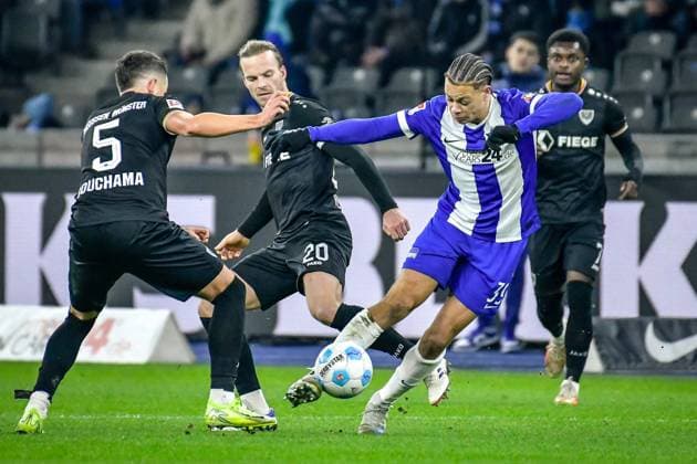 Soccer 2 Bundesliga Hertha BSC Berlin Preußen Münster 13 12 2024, xdanx, Soccer 2 Bundesliga Hertha BSC Berlin Preußen Münster v l Yassine Bouchama SC Preußen Muenster 5 ,Jorrit Hendrix SC Preußen Muenster 20 ,Derry Scherhant Hertha BSC 39 ,duel, duel, fight, tackle DFL DFB REGULATIONS PROHIBIT ANY USE OF PHOTOGRAPHS as IMAGE SEQUENCES and or QUASI VIDEO Daniel Lakomski Mix1 Berlin Olympiastadion Berlin Berlin Germany EN Copyright: xDanielxLakomskix
