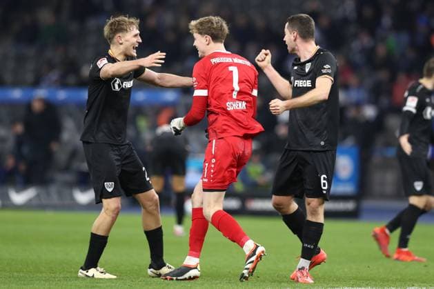 13 12 2024, xtgx, Soccer 2 Bundesliga, Hertha BSC Berlin Preussen Muenster emspor, v l Niko Koulis Muenster, 24 , Johannes Schenk Muenster, 1 , Thomas Kok Muenster, 6 Cheering about the victory, cheering after the match DFL DFB REGULATIONS PROHIBIT ANY USE OF PHOTOGRAPHS as IMAGE SEQUENCES and or QUASI VIDEO Berlin