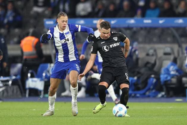 13 12 2024, xtgx, Football 2 Bundesliga, Hertha BSC Berlin SC Preussen Muenster emspor, v l Derry Scherhant Hertha, 39 , Yassine Baouchama Münster, 5 Zweikampf, Duell, Kampf, tackle DFL DFB REGULATIONS PROHIBIT ANY USE OF PHOTOGRAPHS as IMAGE SEQUENCES and or QUASI VIDEO Berlin