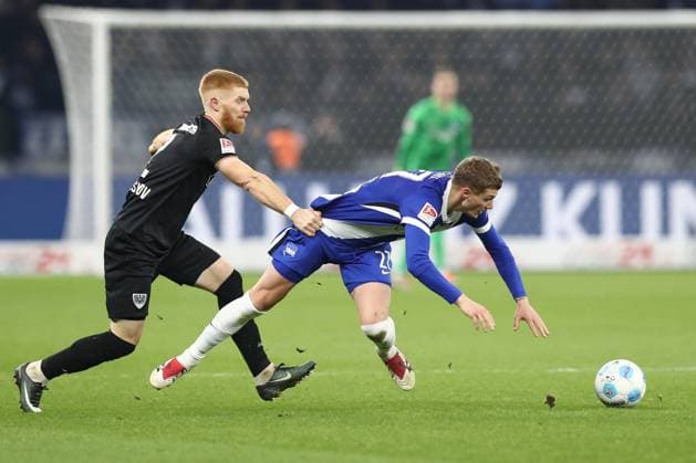 13 12 2024, xtgx, Football 2 Bundesliga, Hertha BSC Berlin SC Preussen Muenster emspor, v l Mikkel Kirkesov Münster, 2 , Michael Cuisance Hertha, 27 duel, duel, fight, tackle DFL DFB REGULATIONS PROHIBIT ANY USE OF PHOTOGRAPHS as IMAGE SEQUENCES and or QUASI VIDEO Berlin