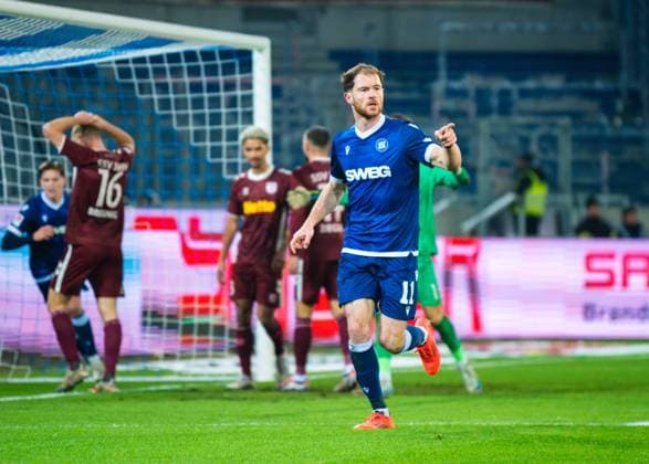 Budu Zivzivadze Karlsruher SC celebrates his first goal during the 2 Bundesliga match between Karlsruher SC and Jahn Regensburg at BBBank Wildpark on December 13, 2024 in Karlsruhe, Germany Photo by Silas Schueller DeFodi Images Budu Zivzivadze Karlsruher SC celebrates after scoring his team s first goal during the 2 Bundesliga match between Karlsruher SC and Jahn Regensburg at BBBank Wildpark on December 13, 2024 in Karlsruhe, Germany Photo by Silas Schueller DeFodi Images DFB DFL REGULATIONS PROHIBIT ANY USE OF PHOTOGRAPHS AS IMAGE SEQUENCES AND OR QUASI VIDEO Photo by Silas Schueller DeFodi Images Defodi 738 738 KSCREG 20241213 1111 Defodi-738 DFB DFL REGULATIONS PROHIBIT ANY USE OF PHOTOGRAPHS AS IMAGE SEQUENCES AND OR QUASI-VIDEO.