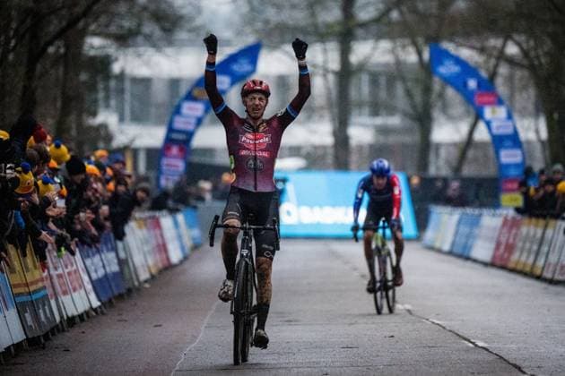 Belgian Michael Vanthourenhout celebrates as he crosses the finish line to win the men s elite race at the Herentals Crosst cyclocross cycling event on Saturday 14 December 2024 in Herentals, stage 4 8 in the X2O Badkamers Trofee Veldrijden competition. JASPERxJACOBS  x108248199x