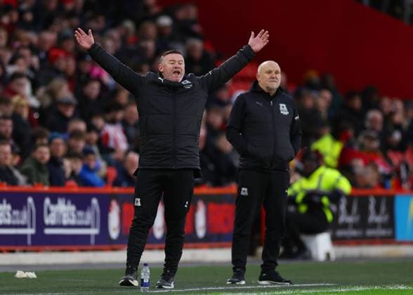 Sheffield, England, 14th December 2024. Wayne Rooney manager of Plymouth Argyle and assistant Mike Phelan during the Sky Bet Championship match at Bramall Lane, Sheffield. Picture credit should read: Simon Bellis Sportimage EDITORIAL USE ONLY. No use with unauthorised audio, video, data, fixture lists, club league logos or live services. Online in-match use limited to 120 images, no video emulation. No use in betting, games or single club league player publications. SPI-3526