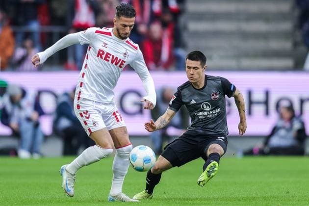 Soccer 2 Bundesliga 16 Matchday 1 FC Köln 1 FC Nürnberg on 15 12 2024 at RheinEnergieStadion in Cologne Leart Pacarada Köln , left Oliver Villadsen Nürnberg , right DFL regulations prohibit any use of photographs as image sequences and or quasi video xJRx