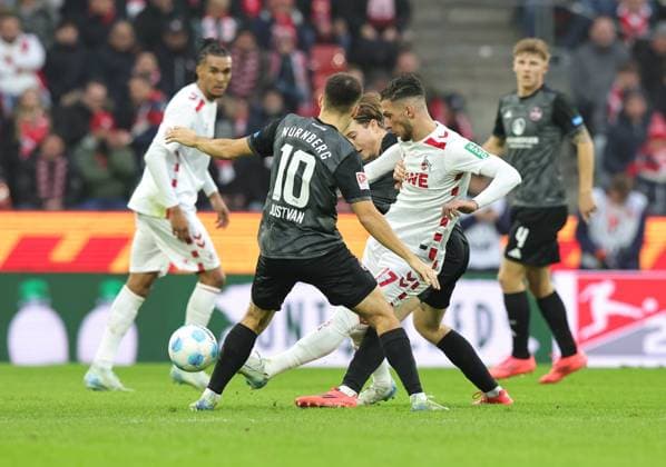 15 12 2024 Soccer season 2024 2025 2 Soccer Bundesliga 16 Matchday 1 FC Köln 1 FC Nürnberg FCN Club Sportfoto Zink DaMa xdaxmax DFL regulations prohibit any use of photographs as image sequences and or quasi video only for editorial use Julian Justvan 10, 1 FC Nürnberg FCN Leart Paqarada 17, FC Köln Caspar Jander 20, 1 FC Nürnberg FCN