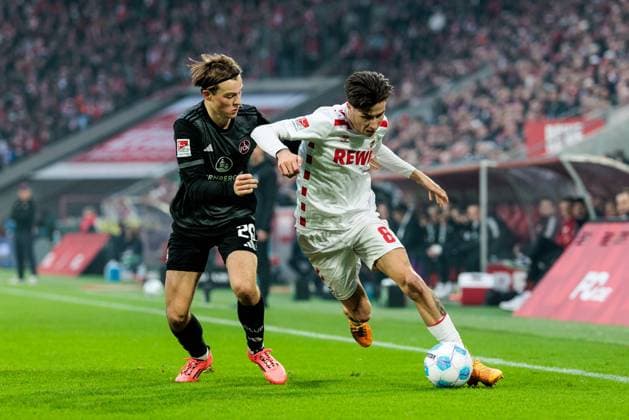 2 Soccer Bundesliga 1 FC Köln 1 FC Nürnberg 15 12 2024 duel Caspar Jander 1 FC Nürnberg, 20 , Denis Huseinbasic 1 FC Köln, 8 2 Soccer Bundesliga 1 FC Köln 1 FC Nürnberg, Cologne, Rheinenergiestadion on 15 12 2024 DFL REGULATIONS PROHIBIT ANY USE OF PHOTOGRAPHS AS IMAGE SEQUENCES AND OR QUASI VIDEO Copyright: xBEAUTIFULxSPORTS Wunderlx