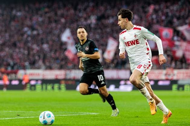 2 Soccer Bundesliga 1 FC Köln 1 FC Nürnberg 15 12 2024 duel Julian Justvan 1 FC Nürnberg, 10 , Denis Huseinbasic 1 FC Köln, 8 2 Soccer Bundesliga 1 FC Köln 1 FC Nürnberg, Cologne, Rheinenergiestadion on 15 12 2024 DFL REGULATIONS PROHIBIT ANY USE OF PHOTOGRAPHS AS IMAGE SEQUENCES AND OR QUASI VIDEO Copyright: xBEAUTIFULxSPORTS Wunderlx