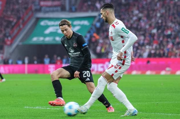 Soccer 2 Bundesliga 16 Matchday 1 FC Köln 1 FC Nürnberg on 15 12 2024 at RheinEnergieStadion in Cologne Caspar Jander Nürnberg , left Leart Pacarada Köln , right DFL regulations prohibit any use of photographs as image sequences and or quasi video xJRx