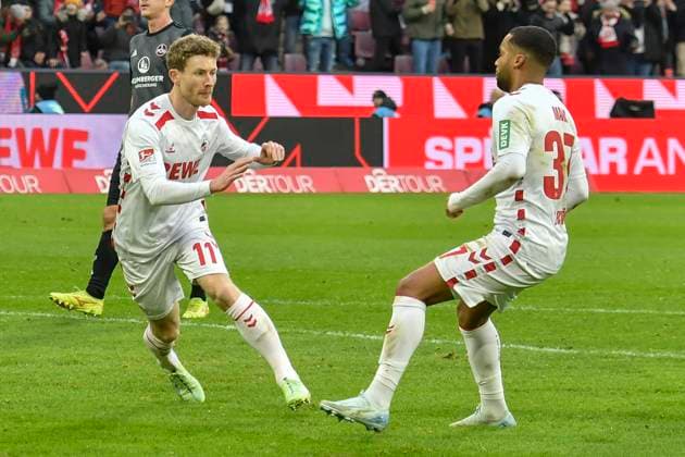 Florian Kainz Koeln 11 cheers after the goal to 2 0, Linton Maina Koeln 37 re 15 12 2024 Soccer 1 FC Koeln vs 1 FC Nuernberg, Rheinenergiestadion, Koeln, DFB DFL REGULATIONS PROHIBIT ANY USE OF PHOTOGRAPHS AS IMAGE SEQUENCES AND OR QUASI VIDEO NRW Germany Copyright: xpepphotox xSaschaxWeizx pep00321, pep_20241215_hm_0026
