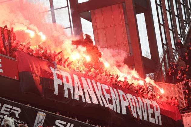 Nuremberg fans with flares, GER, 1 FC Koeln vs 1 FC Nuernberg , 2 Soccer Bundesliga, Matchday 16, Season 2024 2025, 15 12 2024, DFL REGULATES PROHIBIT ANY USE OF PHOTOGRAPHS AS IMAGE SEQUENCES AND OR QUASI VIDEO, GER, 1 FC Koeln vs 1 FC Nuernberg , 2 Soccer Bundesliga, Matchday 16, Season 2024 2025, 15 12 2024 Koeln Copyright: xEibner-Pressefoto JoergxNiebergax EP_JNL