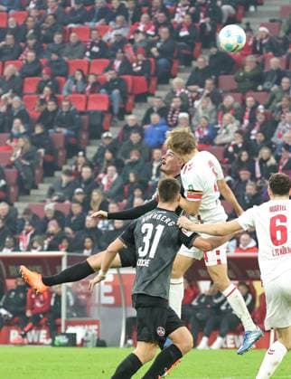 15 12 2024 Soccer season 2024 2025 2 Soccer Bundesliga 16 Matchday 1 FC Köln 1 FC Nürnberg FCN Club Sportfoto Zink DaMa xdaxmax DFL regulations prohibit any use of photographs as image sequences and or quasi video only for editorial use Janni Serra 23, 1 FC Nürnberg FCN in header duel with Timo Hübers Huebers 4, FC Köln