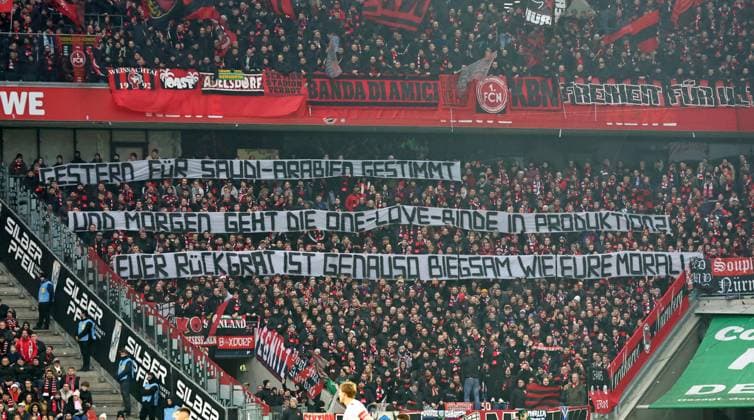 15 12 2024 Soccer season 2024 2025 2 Soccer Bundesliga 16 Matchday 1 FC Köln 1 FC Nürnberg FCN Club Sportfoto Zink DaMa xdaxmax DFL regulations prohibit any use of photographs as image sequences and or quasi video only for editorial use Symbolbild Symbolfoto Feature Impression Spruchband Transparent der Clubfan Clubfans FCN Fans Fans gegen den DFB und die WM in Saudi Arabien