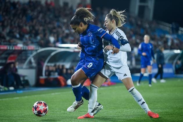 (241218) -- MADRID, Dec. 18, 2024 -- Real Madrid s Olga Carmona (R) vies with Chelsea s Catarina Macario during the UEFA Women s Champions League match between Real Madrid and Chelsea, in Madrid, Spain, Dec. 17, 2024. (Photo by Xinhua) (SP)SPAIN-MADRID-FOOTBALL-WOMEN S CHAMPIONS LEAGUE-REAL MADRID VS CHELSEA GustavoxValiente 