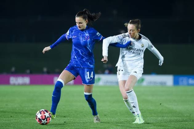 (241218) -- MADRID, Dec. 18, 2024 -- Real Madrid s Caroline Weir (R) vies with Chelsea s Nathalie Bjorn during the UEFA Women s Champions League match between Real Madrid and Chelsea, in Madrid, Spain, Dec. 17, 2024. (Photo by Xinhua) (SP)SPAIN-MADRID-FOOTBALL-WOMEN S CHAMPIONS LEAGUE-REAL MADRID VS CHELSEA GustavoxValiente 