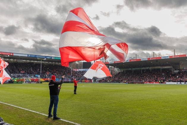 Before kick-off, Cottbus fans wave large flags on the pitch GER, FC Energie Cottbus vs FC Hansa Rostock, Football, Men, 3 Liga, Matchday 18, Season 2024 2025, 15 12 2024 Cottbus LEAG Energie Stadion Brandenburg Germany
