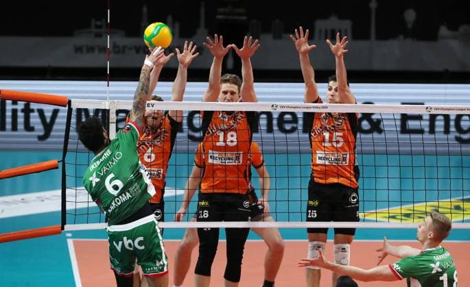 Francisco Iribarne in attack, Johannes Tille, Florian Krage, Moritz Reichert duel Match scene Action Sport Volleyball CEV Champions League Men Season 2024 2025 18 12 2024 BR Volleys Berlin BRV vs Greenyard Maaseik