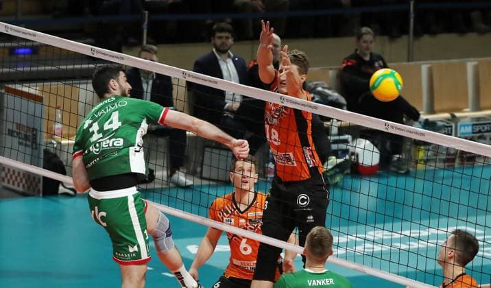 Miguel Angel in attack, Florian Krage duel Match scene Action Sport Volleyball CEV Champions League Men Season 2024 2025 18 12 2024 BR Volleys Berlin BRV vs Greenyard Maaseik
