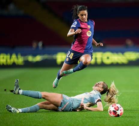 (241219) -- BARCELONA, Dec. 19, 2024 -- Barcelona s Esmee Brugts (Top) vies with Manchester City s Laia Aleixandri during the UEFA Women s Champions League match between Barcelona and Manchester City at Lluis Companys Olympic Stadium in Barcelona, Spain, Dec. 18, 2024. (Photo by Xinhua) (SP)SPAIN-BARCELONA-FOOTBALL-WOMEN S CHAMPIONS LEAGUE-BARCELONA VS MANCHESTER CITY JoanxGosa 