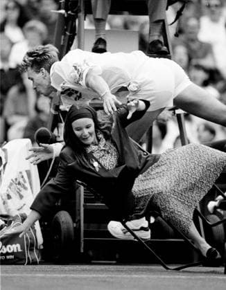 CHRIS BAILEY KNOCKS OVER THE NETCORD JUDGE DURING HIS CENTRE COURT MATCH WITH GORAN IVANISEVIC, 1993. PICTURE DAVID ASHDOWN 5belter.jpg DMGTCHPDPICT000349933516