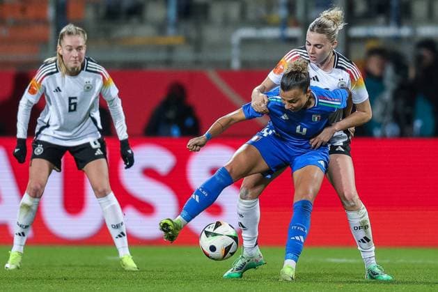 Womens international soccer match Germany Italy on 02 12 2024 at Vonovia Ruhrstadion in Bochum Arianna Caruso Italy , front Janina Minge Germany , back DFB regulations prohibit any use of photographs as image sequences and or quasi video xJRx