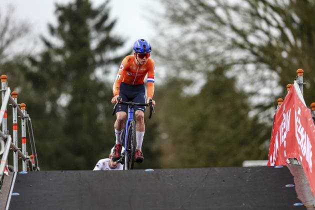 Dutch Tibor Del Grosso celebrates as he crosses the finish line to win the men s U23 race at the World Cup cyclocross cycling event in Hulst, The netherlands, stage 5 (out of 12) of the UCI World Cup cyclocross competition, Saturday 21 December 2024. DAVIDxPINTENS  x108935037x