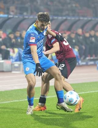 21 12 2024 Soccer Season 2024 2025 2 Soccer Bundesliga 17 Matchday 1 FC Nürnberg FCN Club Eintracht Braunschweig EBS BTSV Sportfoto Zink DaMa xdaxmax DFL regulations prohibit any use of photographs as image sequences and or quasi video only for editorial use Max Marie 15, Eintracht Braunschweig BTSV EBS Tim Janisch 32, 1 FC Nürnberg FCN