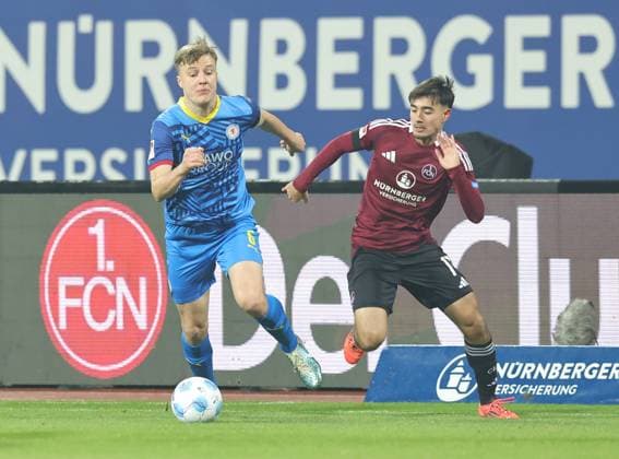21 12 2024 Soccer Season 2024 2025 2 Soccer Bundesliga 17 Matchday 1 FC Nürnberg FCN Club Eintracht Braunschweig EBS BTSV Sportfoto Zink DaMa xdaxmax DFL regulations prohibit any use of photographs as image sequences and or quasi video only for editorial use Ermin Bicakcic 6, Eintracht Braunschweig BTSV EBS Jens Castrop 17, 1 FC Nürnberg FCN