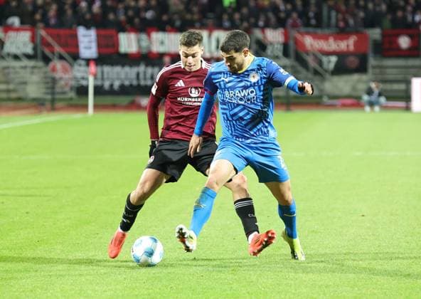 21 12 2024 Soccer Season 2024 2025 2 Soccer Bundesliga 17 Matchday 1 FC Nürnberg FCN Club Eintracht Braunschweig EBS BTSV Sportfoto Zink DaMa xdaxmax DFL regulations prohibit any use of photographs as image sequences and or quasi video only for editorial use Stefanos Tzimas 9, 1 FC Nürnberg FCN Fabio Di Michele Sanchez 22, Eintracht Braunschweig BTSV EBS