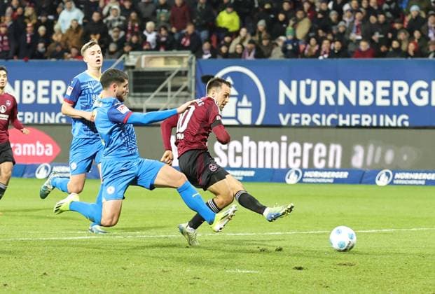 21 12 2024 Soccer Season 2024 2025 2 Soccer Bundesliga 17 Matchday 1 FC Nürnberg FCN Club Eintracht Braunschweig EBS BTSV Sportfoto Zink DaMa xdaxmax DFL regulations prohibit any use of photographs as image sequences and or quasi video only for editorial use Julian Justvan 10, 1 FC Nürnberg FCN with shot on goal