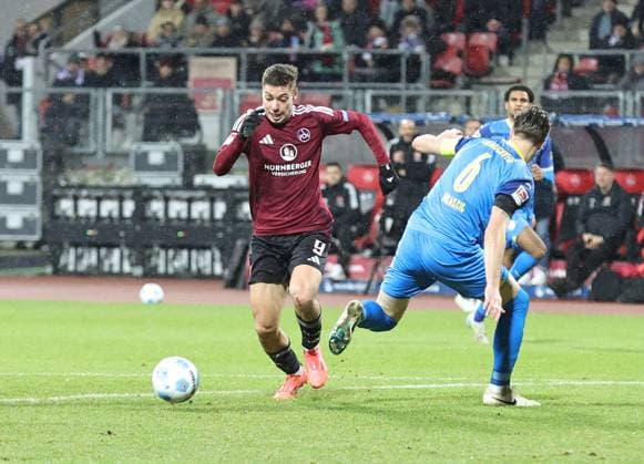 21 12 2024 Soccer Season 2024 2025 2 Soccer Bundesliga 17 Matchday 1 FC Nürnberg FCN Club Eintracht Braunschweig EBS BTSV Sportfoto Zink DaMa xdaxmax DFL regulations prohibit any use of photographs as image sequences and or quasi video only for editorial use Stefanos Tzimas 9, 1 FC Nürnberg FCN Ermin Bicakcic 6, Eintracht Braunschweig BTSV EBS