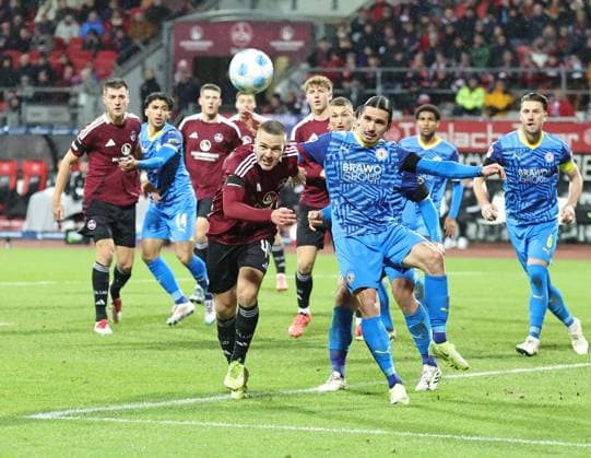 21 12 2024 Soccer Season 2024 2025 2 Soccer Bundesliga 17 Matchday 1 FC Nürnberg FCN Club Eintracht Braunschweig EBS BTSV Sportfoto Zink DaMa xdaxmax DFL regulations prohibit any use of photographs as image sequences and or quasi video only for editorial use Ondrej Karafiat 44, 1 FC Nürnberg FCN Rayan Philippe 9, Eintracht Braunschweig BTSV EBS