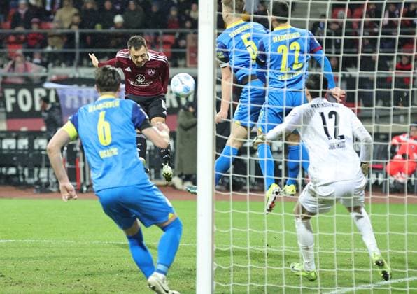 21 12 2024 Soccer Season 2024 2025 2 Soccer Bundesliga 17 Matchday 1 FC Nürnberg FCN Club Eintracht Braunschweig EBS BTSV Sportfoto Zink DaMa xdaxmax DFL regulations prohibit any use of photographs as image sequences and or quasi video only for editorial use Julian Justvan 10, 1 FC Nürnberg FCN with header