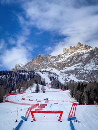 Finish at Tofana ski racing slope in Cortina d Ampezzo, Italy Cortina d Ampezzo, Italy - January 28, 2023: Finish at Tofana ski racing World Cup slope against blue sky with clouds (License=RM) 22522767 Copyright: xZoonar.com FabianxMesebergx 22522767