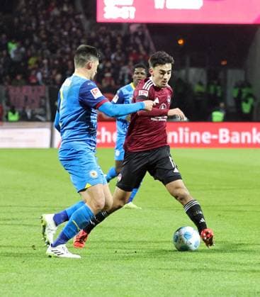 21 12 2024 Soccer Season 2024 2025 2 Soccer Bundesliga 17 Matchday 1 FC Nürnberg FCN Club Eintracht Braunschweig EBS BTSV Sportfoto Zink DaMa xdaxmax DFL regulations prohibit any use of photographs as image sequences and or quasi video only for editorial use Jannis Nikolaou 4, Eintracht Braunschweig BTSV EBS Jens Castrop 17, 1 FC Nürnberg FCN