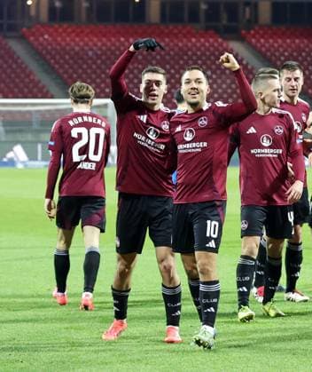 21 12 2024 Soccer Season 2024 2025 2 Soccer Bundesliga 17 Matchday 1 FC Nürnberg FCN Club Eintracht Braunschweig EBS BTSV Sportfoto Zink DaMa xdaxmax DFL regulations prohibit any use of photographs as image sequences and or quasi video only for editorial use Jubel Freude Torjubel nach Tor zum 1 0 Stefanos Tzimas 9, 1 FC Nürnberg FCN Julian Justvan 10, 1 FC Nürnberg FCN und Mannschaft Team jubelt freut sich Torschütze Stefanos Tzimas 9, 1 FC Nürnberg FCN