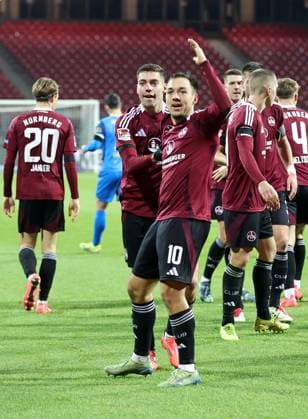 21 12 2024 Soccer Season 2024 2025 2 Soccer Bundesliga 17 Matchday 1 FC Nürnberg FCN Club Eintracht Braunschweig EBS BTSV Sportfoto Zink DaMa xdaxmax DFL regulations prohibit any use of photographs as image sequences and or quasi video only for editorial use Jubel Freude Torjubel nach Tor zum 1 0 Stefanos Tzimas 9, 1 FC Nürnberg FCN Julian Justvan 10, 1 FC Nürnberg FCN und Mannschaft Team jubelt freut sich Torschütze Stefanos Tzimas 9, 1 FC Nürnberg FCN