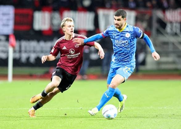 21 12 2024 Soccer Season 2024 2025 2 Soccer Bundesliga 17 Matchday 1 FC Nürnberg FCN Club Eintracht Braunschweig EBS BTSV Sportfoto Zink DaMa xdaxmax DFL regulations prohibit any use of photographs as image sequences and or quasi video only for editorial use Tim Janisch 32, 1 FC Nürnberg FCN Fabio Di Michele Sanchez 22, Eintracht Braunschweig BTSV EBS
