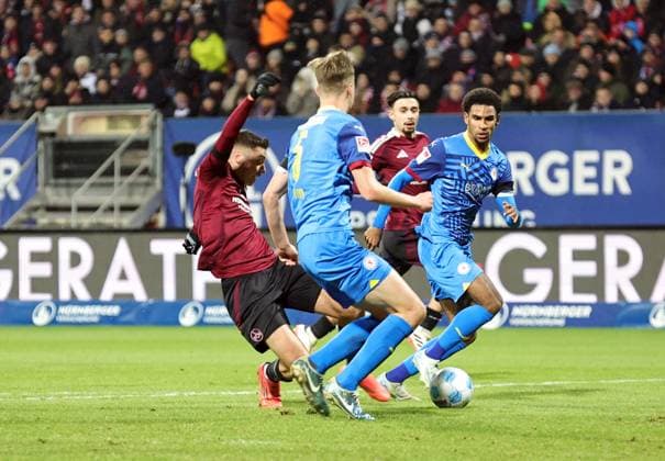 21 12 2024 Soccer Season 2024 2025 2 Soccer Bundesliga 17 Matchday 1 FC Nürnberg FCN Club Eintracht Braunschweig EBS BTSV Sportfoto Zink DaMa xdaxmax DFL regulations prohibit any use of photographs as image sequences and or quasi video only for editorial use Stefanos Tzimas 9, 1 FC Nürnberg FCN mit Torschuss gg Robert Ivanov 5, Eintracht Braunschweig BTSV EBS