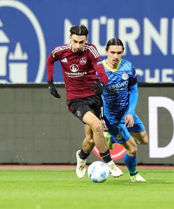 21 12 2024 Soccer Season 2024 2025 2 Soccer Bundesliga 17 Matchday 1 FC Nürnberg FCN Club Eintracht Braunschweig EBS BTSV Sportfoto Zink DaMa xdaxmax DFL regulations prohibit any use of photographs as image sequences and or quasi video only for editorial use Berkay Yilmaz 21, 1 FC Nürnberg FCN Rayan Philippe 9, Eintracht Braunschweig BTSV EBS