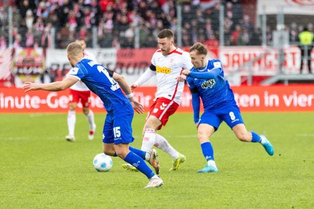 22 12 2024, Soccer, GER, Season, 2 Liga, Season 2024 2025, 17 Matchday, SSV Jahn Regensburg SV Darmstadt 98 Christian Kühlwetter SSV Jahn Regensburg vs Luca Marseiler and Fabian Nürnberger DFL REGULATIONS PROHIBIT ANY USE OF PHOTOGRAPHS AS IMAGE SEQUENCES AND OR QUASI VIDEO Regensburg Bayern Germany Jahnstadion Regensburg