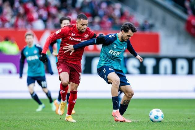 2 Soccer Bundesliga 1 FC Kaiserslautern 1 FC Köln 22 12 2024 duel Jan Gyamerah 1 FC Kaiserslautern, 32 , Max Finkgräfe 1 FC Köln, 35 2 Soccer Bundesliga, 1 FC Kaiserslautern 1 FC Köln, Kaiserslautern, Fritz Walter Stadion on 22 12 2024 DFL REGULATIONS PROHIBIT ANY USE OF PHOTOGRAPHS AS IMAGE SEQUENCES AND OR QUASI VIDEO Copyright: xBEAUTIFULxSPORTS Wunderlx