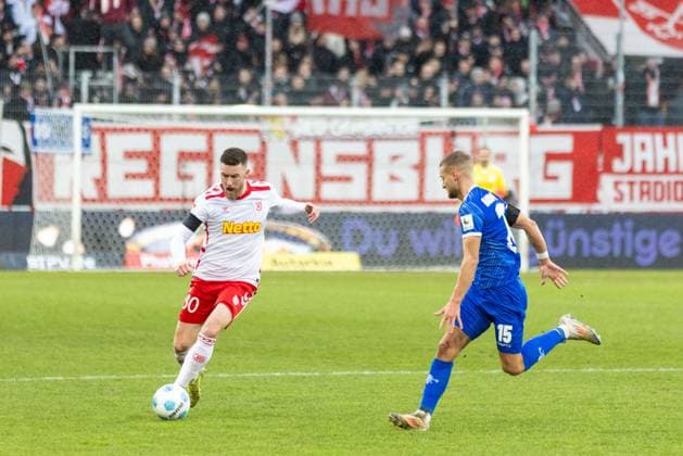 22 12 2024, Soccer, GER, Season, 2 Liga, Season 2024 2025, 17 Matchday, SSV Jahn Regensburg SV Darmstadt 98 Christian Kühlwetter SSV Jahn Regensburg vs Fabian Nürnberger DFL REGULATIONS PROHIBIT ANY USE OF PHOTOGRAPHS AS IMAGE SEQUENCES AND OR QUASI VIDEO Regensburg Bayern Germany Jahnstadion Regensburg
