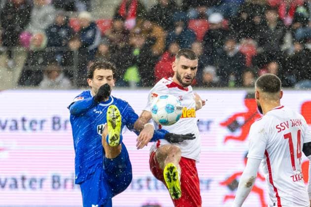 22 12 2024, Soccer, GER, Season, 2 Liga, Season 2024 2025, Matchday 17, SSV Jahn Regensburg SV Darmstadt 98 Fraser Hornby vs Rasim Bulic SSV Jahn DFL REGULATIONS PROHIBIT ANY USE OF PHOTOGRAPHS AS IMAGE SEQUENCES AND OR QUASI VIDEO Regensburg Bayern Germany Jahnstadion Regensburg
