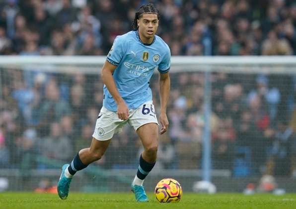 Manchester, England, 26th December 2024. Jahmai Simpson-Pusey of Manchester City during the Premier League match at the Etihad Stadium, Manchester. Picture credit should read: Andrew Yates Sportimage EDITORIAL USE ONLY. No use with unauthorised audio, video, data, fixture lists, club league logos or live services. Online in-match use limited to 120 images, no video emulation. No use in betting, games or single club league player publications. SPI_048_AY_MAN_CITY_EVERTON SPI-3550-0044