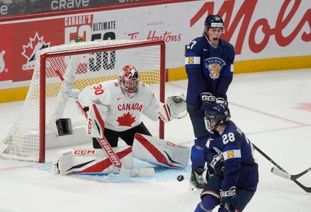 December 26, 2024, Ottawa, On, Canada: Finland forward Heikki Ruohonen (28) and forward Julius Miettinen try to screen Canada goaltender Carter George as he makes a save during third period IIHF World Junior Hockey Championship tournament action, Thursday, Dec.26, 2024 in Ottawa. Carter George Julius Miettinen Heikki Ruohonen  - ZUMAc35_ 20241226_zaf_c35_096 Copyright: xAdrianxWyldx