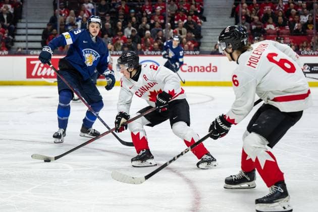 241226 Kalle Kangas of Finland and Calum Ritchie of Canada during the 2025 IIHF World Junior Championship game between Finland and Canada on December 26, 2024 in Ottawa Photo Mathias Bergeld BILDBYRAN kod MB MB1026 ishockey ice hockey jvm junior vm u20 2025 iihf world junior championship world juniors finland canada kanada 1 bbeng  Copyright: MATHIASxBERGELD BB241226MB146