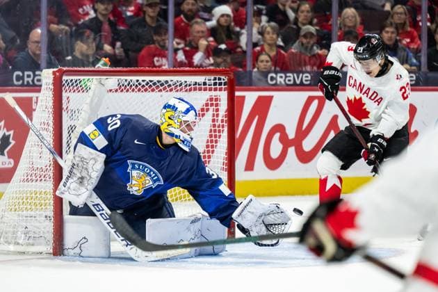 241226 goaltender Petteri Rimpinen of Finland and Tanner Howe of Canada during the 2025 IIHF World Junior Championship game between Finland and Canada on December 26, 2024 in Ottawa Photo Mathias Bergeld BILDBYRAN kod MB MB1026 ishockey ice hockey jvm junior vm u20 2025 iihf world junior championship world juniors finland canada kanada 1 bbeng  Copyright: MATHIASxBERGELD BB241226MB151