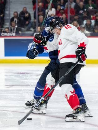 241226 Mitja Jokinen of Finland and Bradly Nadeau of Canada during the 2025 IIHF World Junior Championship game between Finland and Canada on December 26, 2024 in Ottawa Photo Mathias Bergeld BILDBYRAN kod MB MB1026 ishockey ice hockey jvm junior vm u20 2025 iihf world junior championship world juniors finland canada kanada 1 bbeng  Copyright: MATHIASxBERGELD BB241226MB156