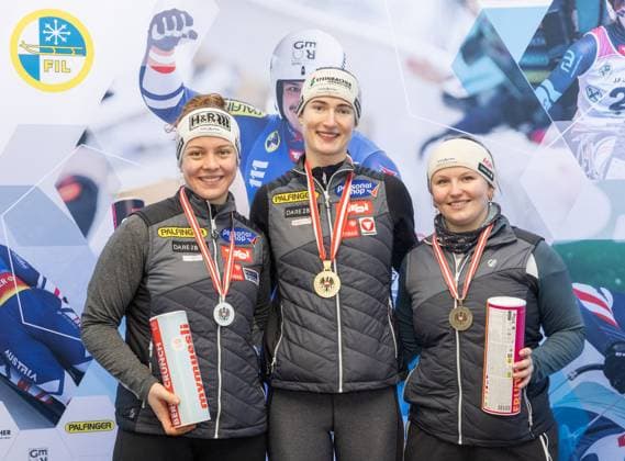 photographer FIL Michael Kristen 28 12 2024 Austrian Championships, Olympia Ice Track Innsbruck Igls, Tirol, Austria AUT , Award Ceremony, Women™s Singles, picture Lisa Schulte AUT, 2nd place , Madeleine Egle AUT, 1st place , Dorothea Schwarz AUT, 3rd place